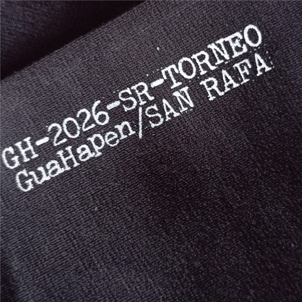 Camiseta negra silueta clásica GuaHapen Torneo San Rafa microfútbol Medellín